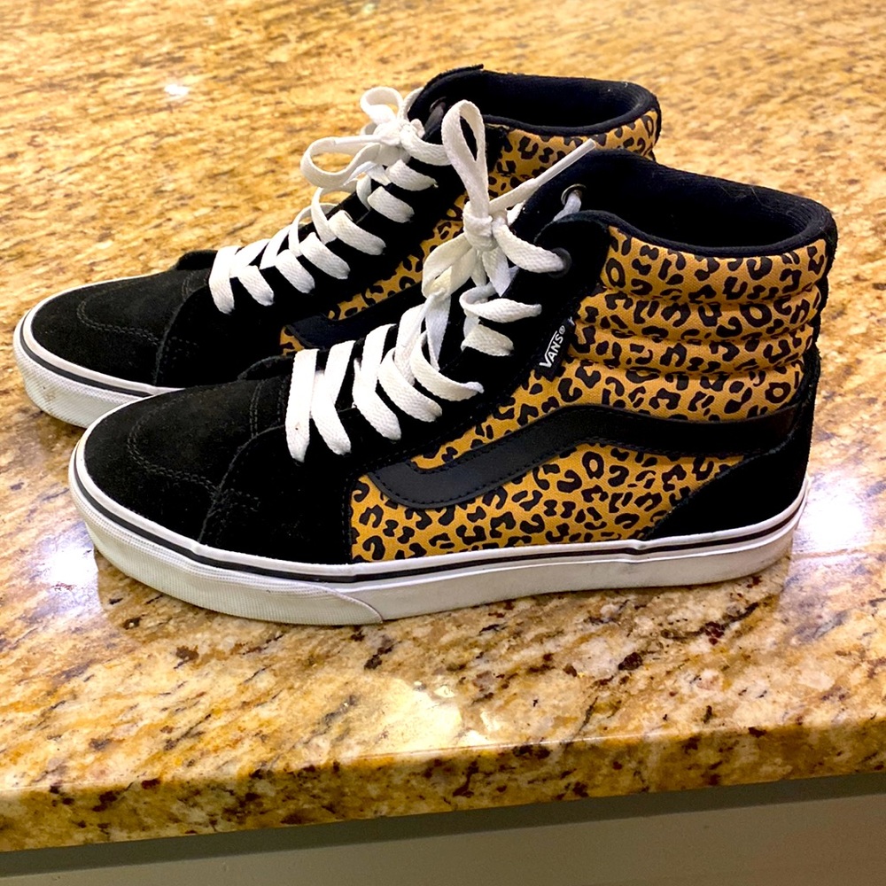 Vans high tops.